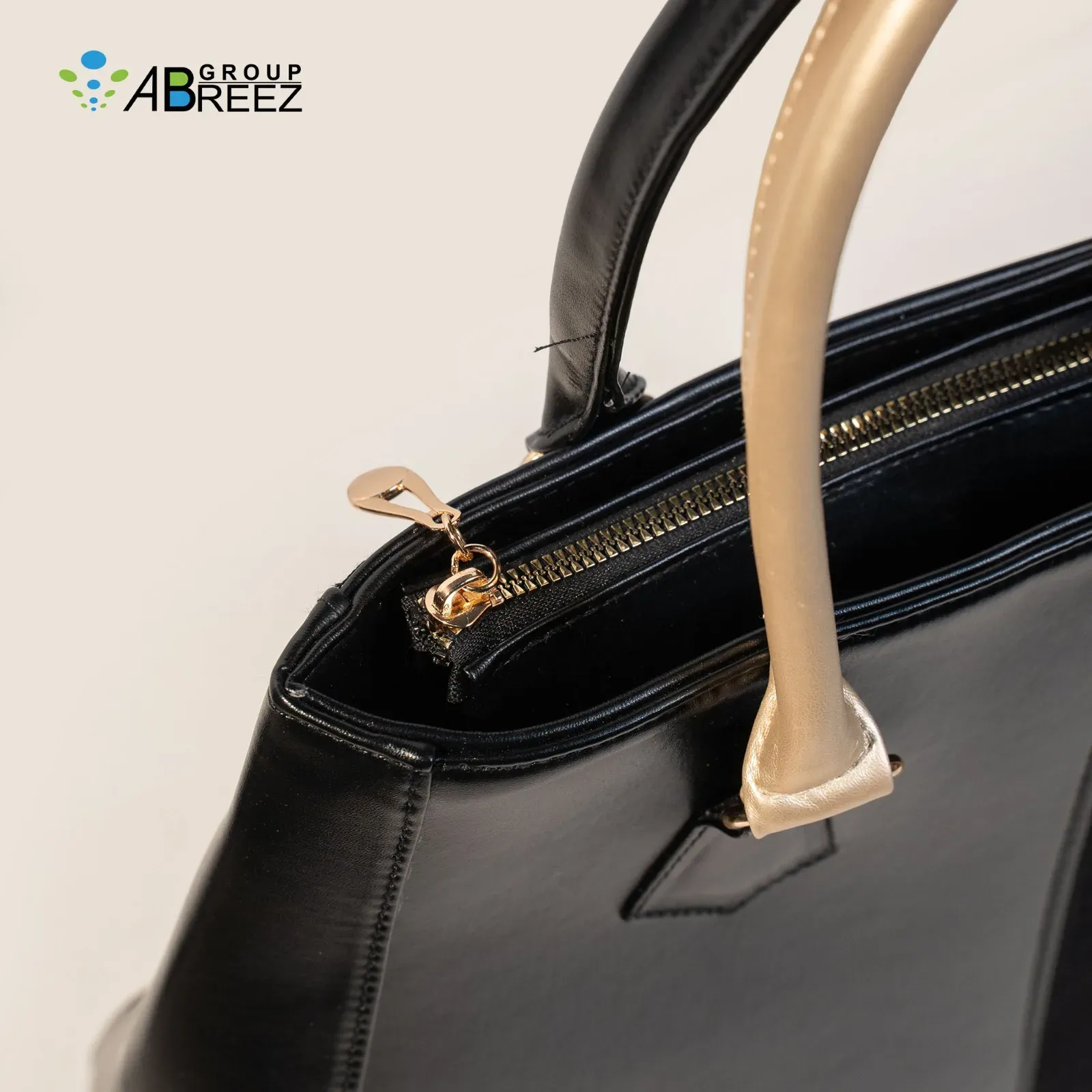 This is a black women's handbag by ABREEZ Group — Black&Gold