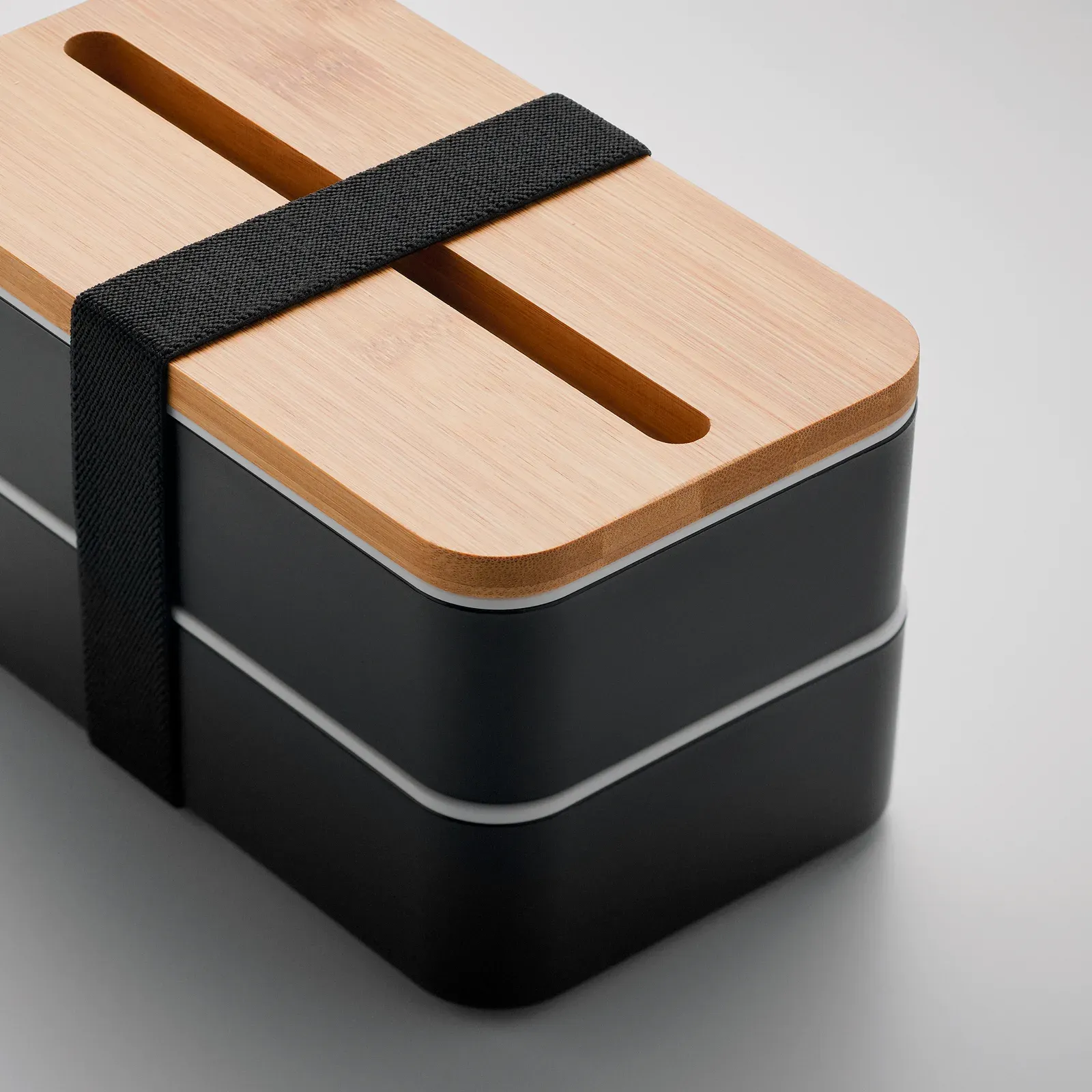 Wint – PP Two-Tier Lunch Box with Removable Divider and 3 Cutlery Utensils with Attachable Polyester Band with Bamboo Lid — Black
