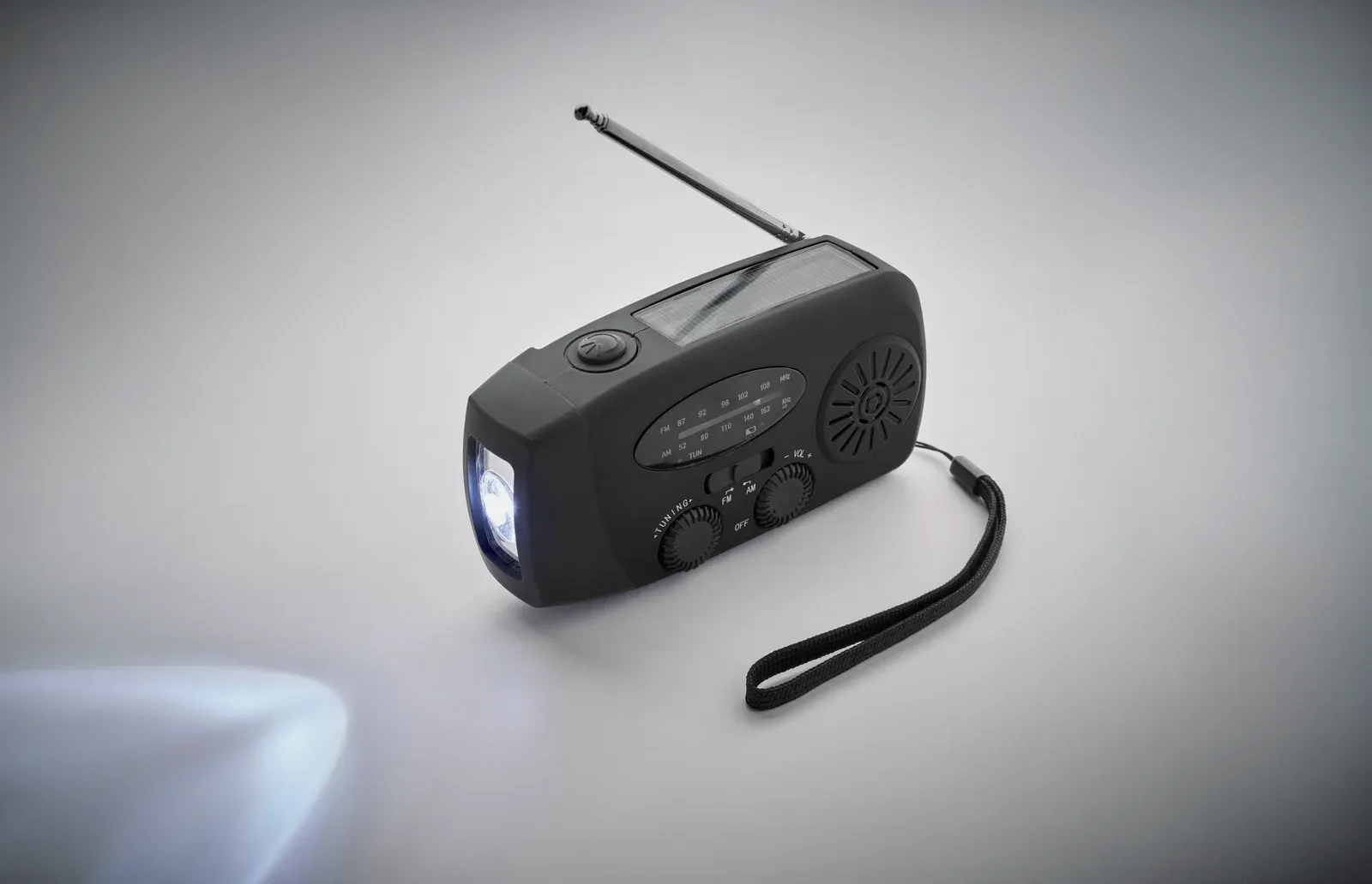 Onda Portable AM/FM Radio with LED Torch – Solar & Hand-Crank Powered — Black