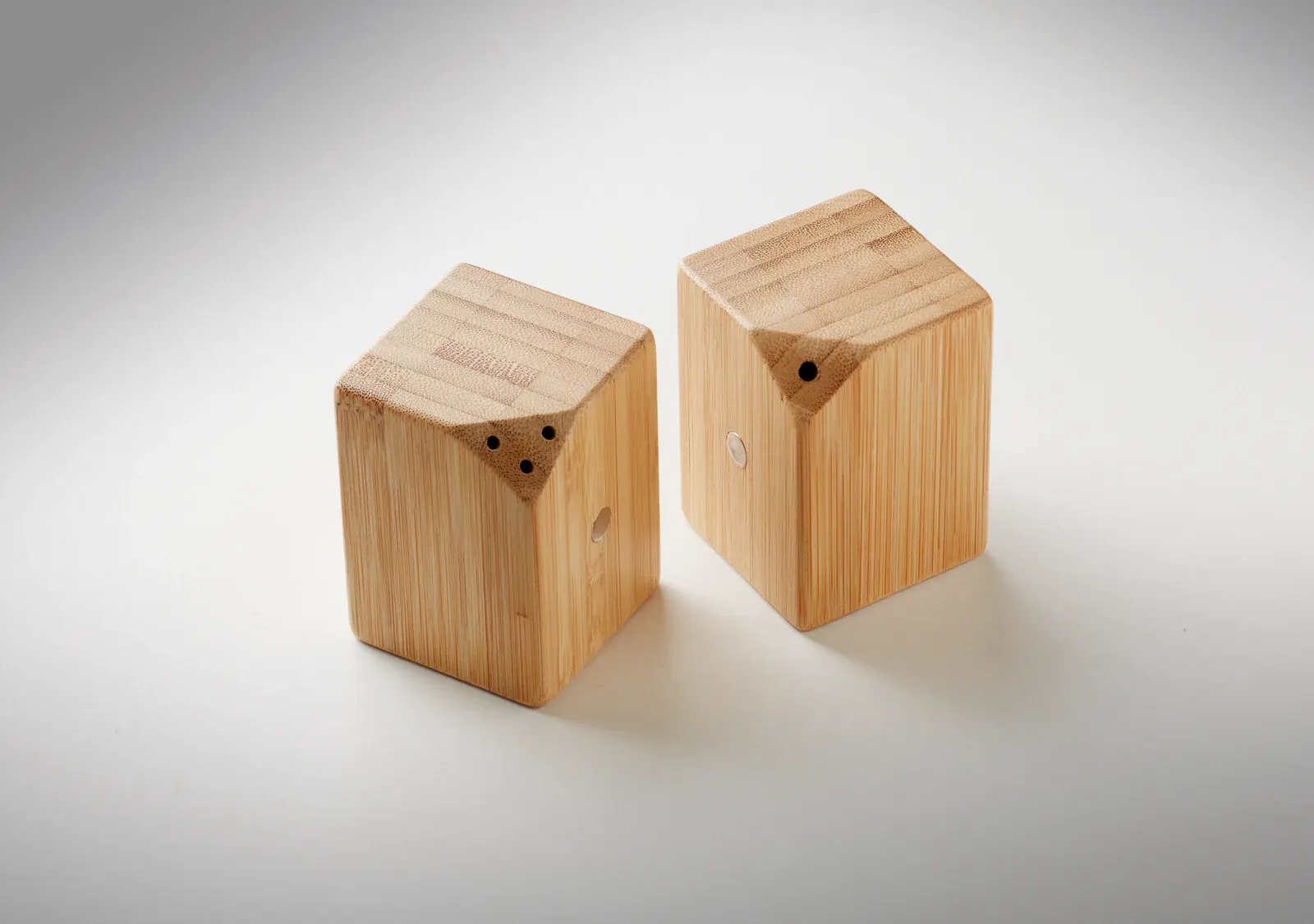 Both – Magnetic Bamboo Salt and Pepper Set with PP Plug Closure at the Base; The Two Shakers Connect Magnetically — Wood