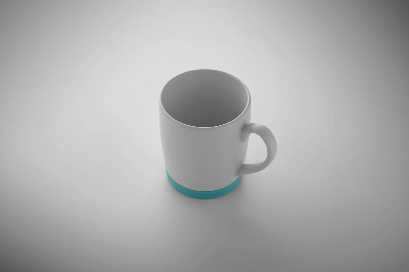 Silbase – Ceramic Mug with White Matt Finish and Silicone Base for Stability; Individual Packing in White Carton Box — Petrol
